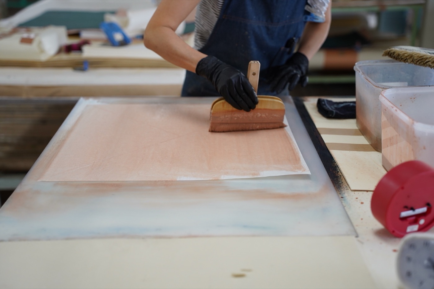Laying pigment with a broad brush